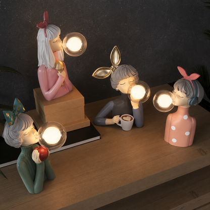 Dekoracyjna lampka LED „dziewczynka z balonem” – designerska figura do salonu i biura