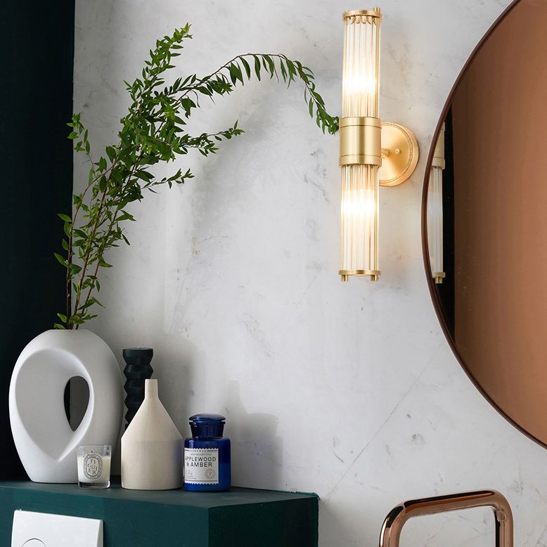 Kristy – Elegancka cylindryczna lampa ścienna w kolorze złotym ze szkła i metalu 3