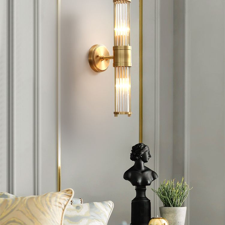 Kristy – Elegancka cylindryczna lampa ścienna w kolorze złotym ze szkła i metalu 6