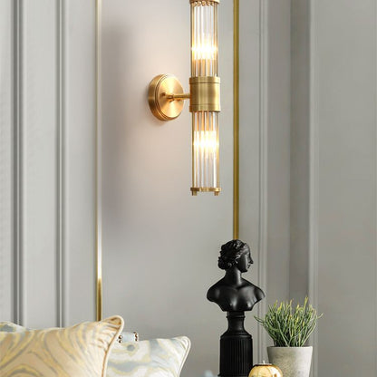 Kristy – Elegancka cylindryczna lampa ścienna w kolorze złotym ze szkła i metalu 6
