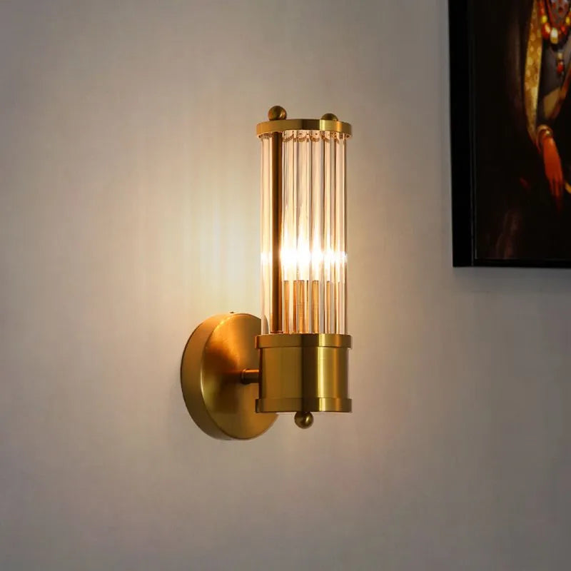 Kristy – Elegancka cylindryczna lampa ścienna w kolorze złotym ze szkła i metalu 7