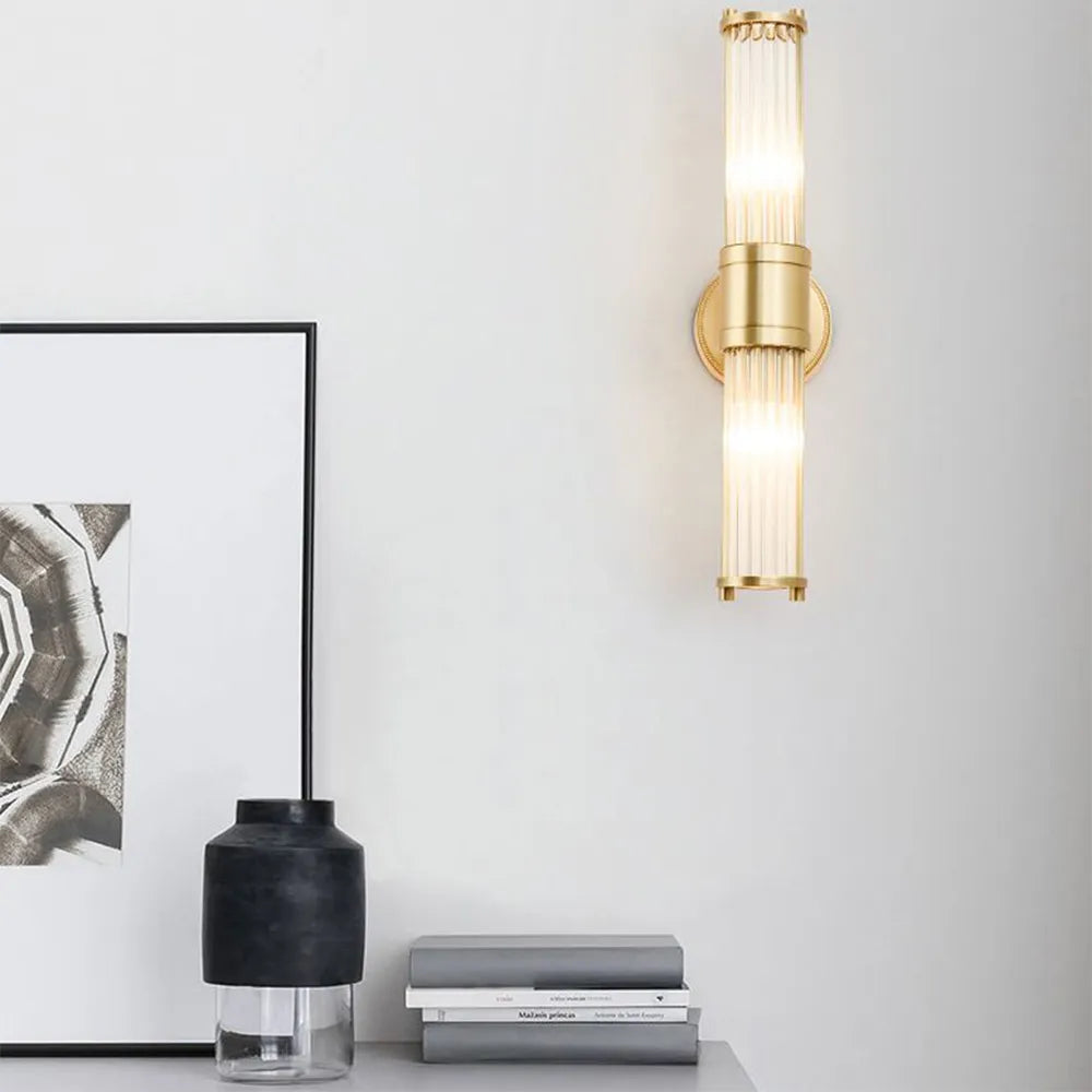 Kristy – Elegancka cylindryczna lampa ścienna w kolorze złotym ze szkła i metalu 8