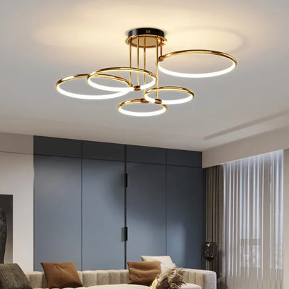 Nowoczesny żyrandol LED z pierścieniami – lampa sufitowa z geometryczną formą