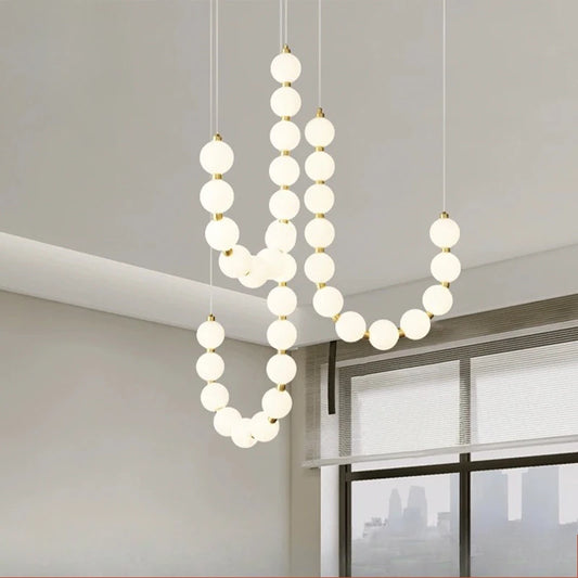 Lampa wisząca LED nowoczesna – efektowna forma naszyjnika z kulami świetlnymi