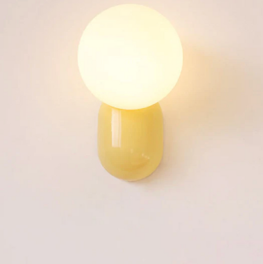 Nowoczesny kinkiet kula LED – designerska lampa ścienna