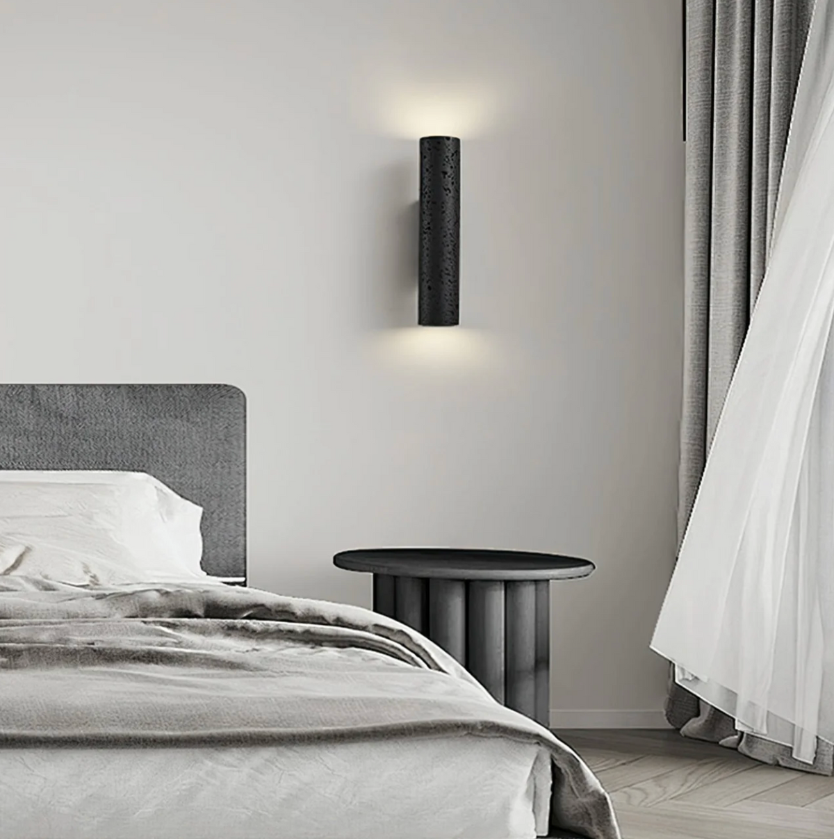 Nowoczesna lampa ścienna tubowa – czarna, minimalistyczny kinkiet góra–dół