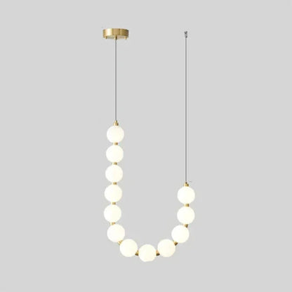 Lampa wisząca LED nowoczesna – efektowna forma naszyjnika z kulami świetlnymi