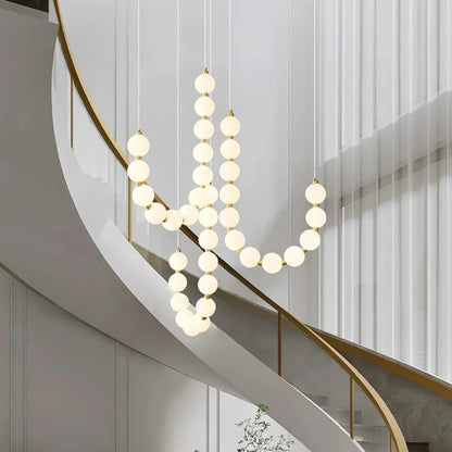 Lampa wisząca LED nowoczesna – efektowna forma naszyjnika z kulami świetlnymi